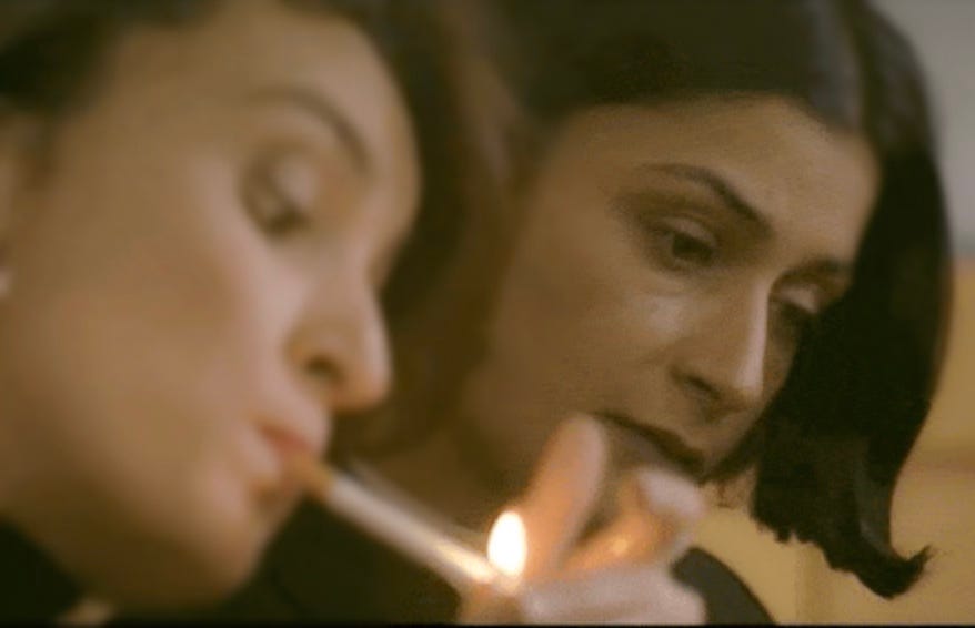 Anna in the BBC television series 'this life' sitting next to Milly and lighting a cigarette in a non-smoking area