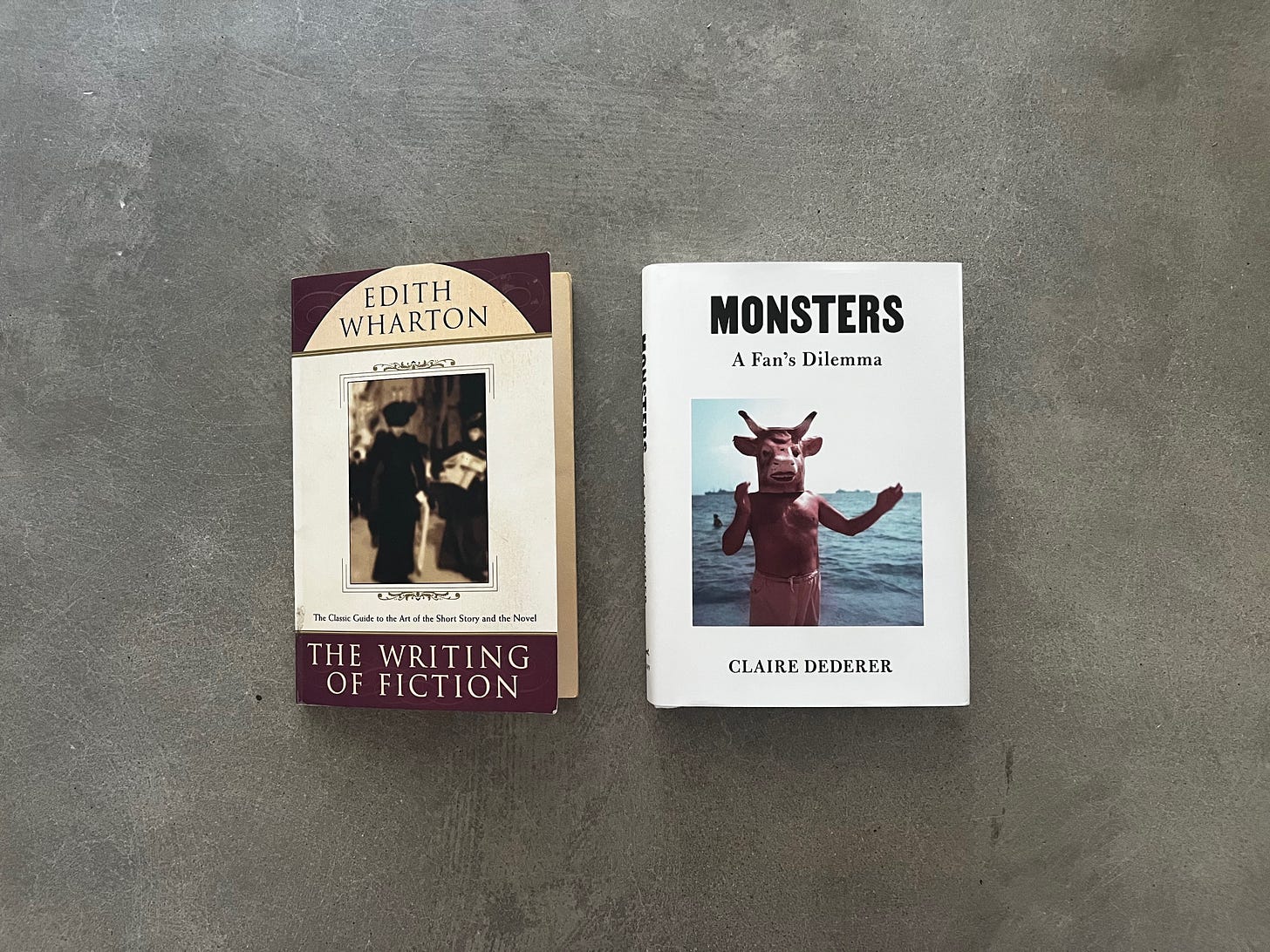 my copies of Edith Wharton's 'The Writing of Fiction' and Claire Dederer's 'Monsters' on my concrete floor