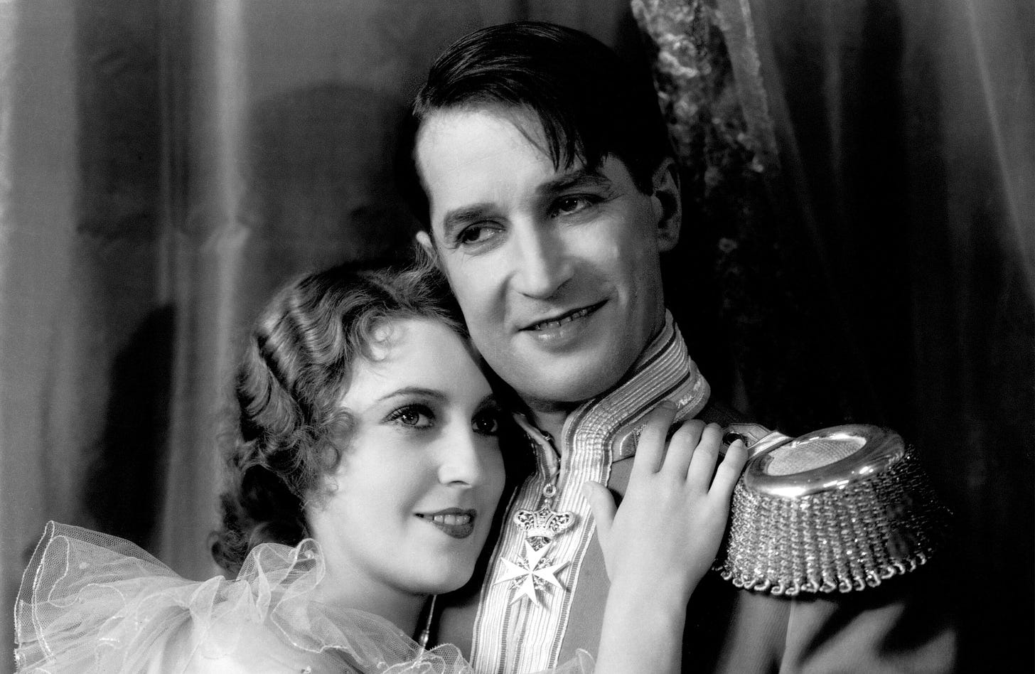 Jeanette MacDonald and Maurice Chevalier in a still from The Love Parade