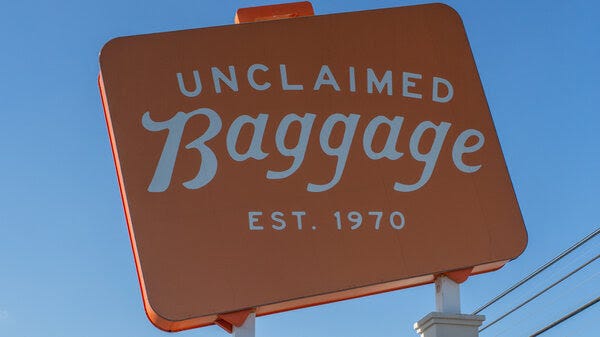 The sign for the Unclaimed Baggage store in Scottsboro, Ala.