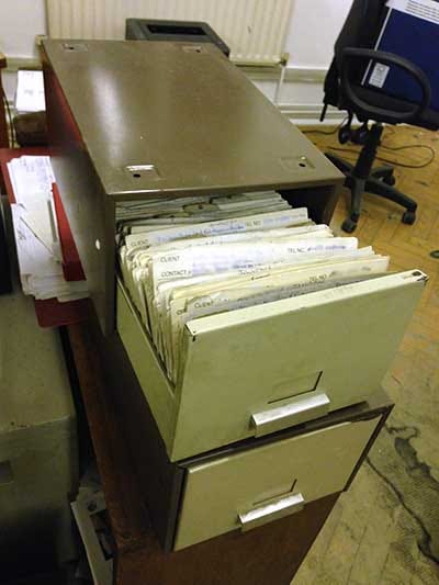 Photo of an ancient reference card filing cabinet.