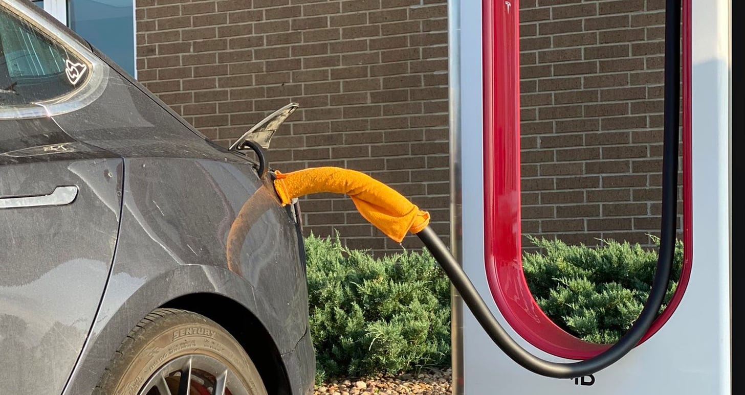 Tesla warns against wet towel trick to speed up Supercharging | Electrek