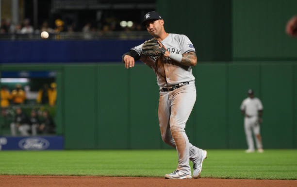 Gleyber Torres of the New York Yankees throws to first base to force out Jack Suwinski of the Pittsburgh Pirates in the seventh inning during the...