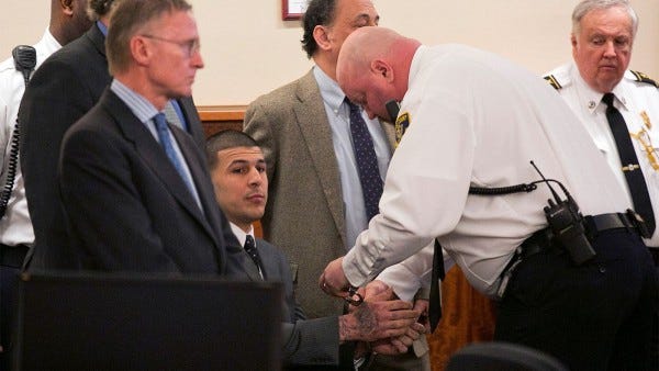 aaron hernandez being cuffed again after guilty verdict 2015