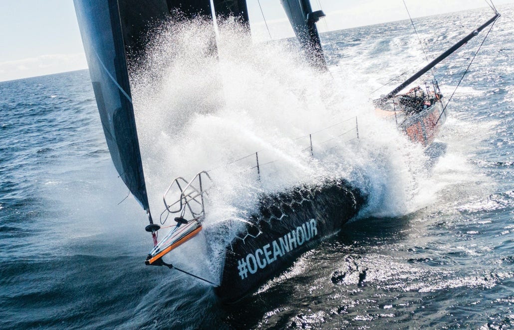 A picture containing a race boat during The Ocean Race 2023, an around the world sailing race.