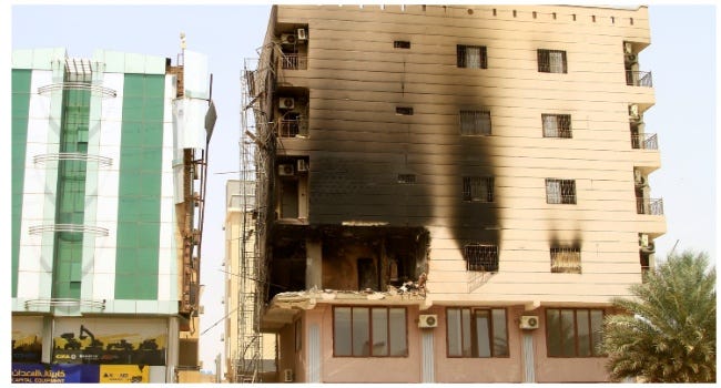 This image shows a building damaged during battles between the forces of two rival Sudanese generals in the southern part of Khartoum, on April 23, 2023. (Photo by AFP)