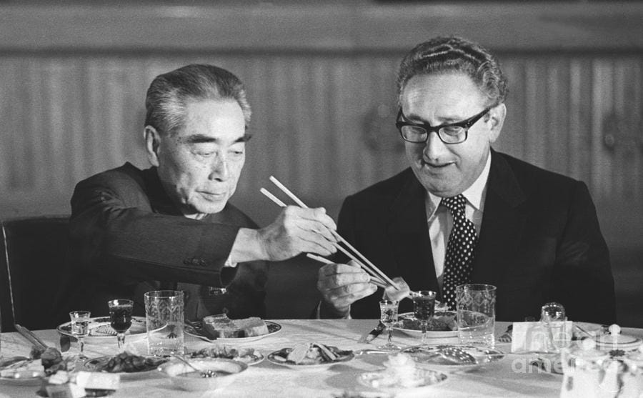 Kissinger Eating With Zhou Enlai by Bettmann