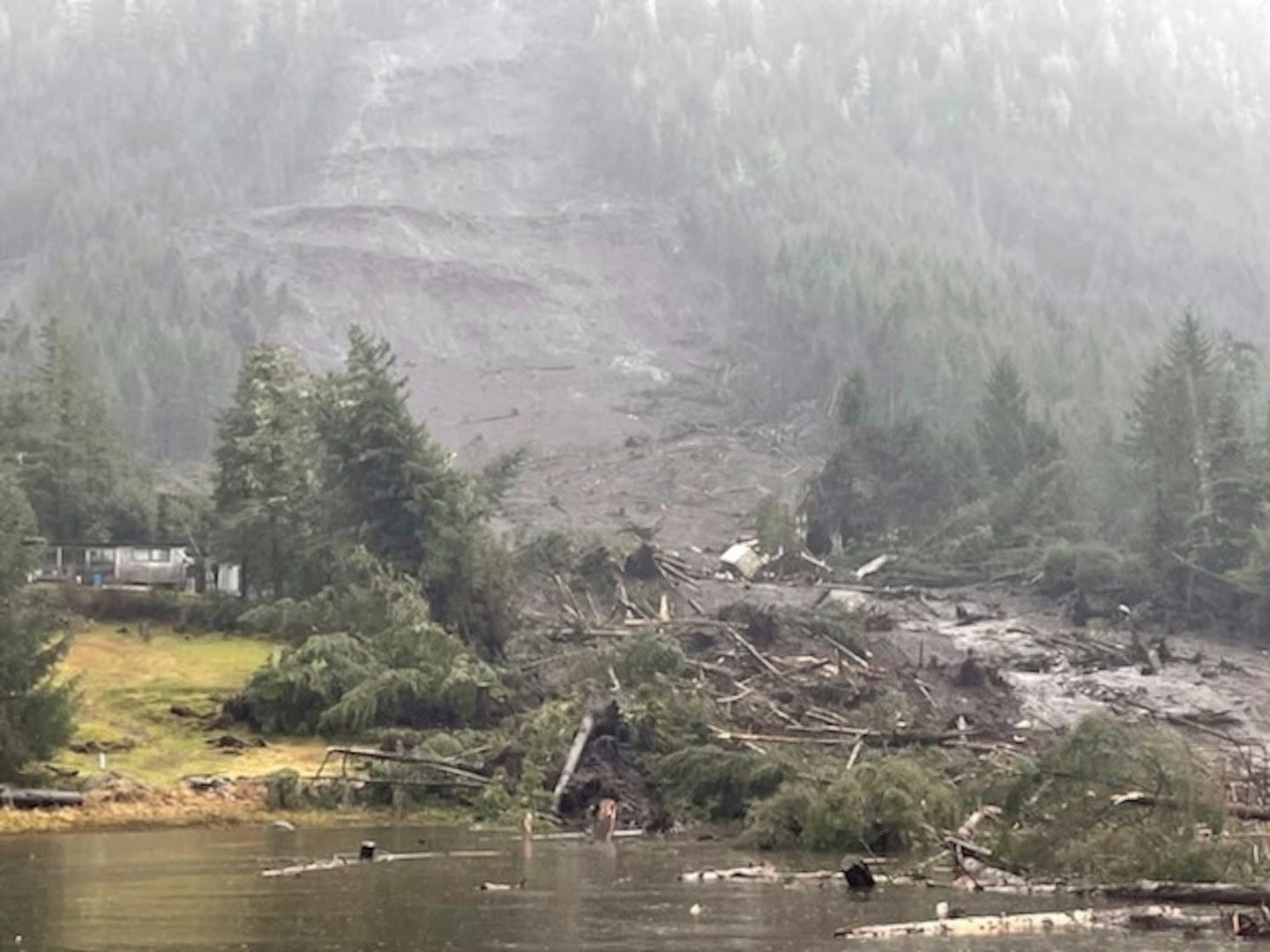 In this image provided by the U.S. Coast Guard is the aftermath of a landslide in Wrangell, Alaska.