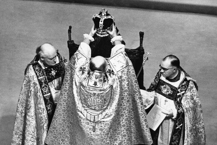 The Archbishop of Canterbury holds the ritual crown of England over the head of Queen Elizabeth II, during coronation ceremonies on June 2, 1953.