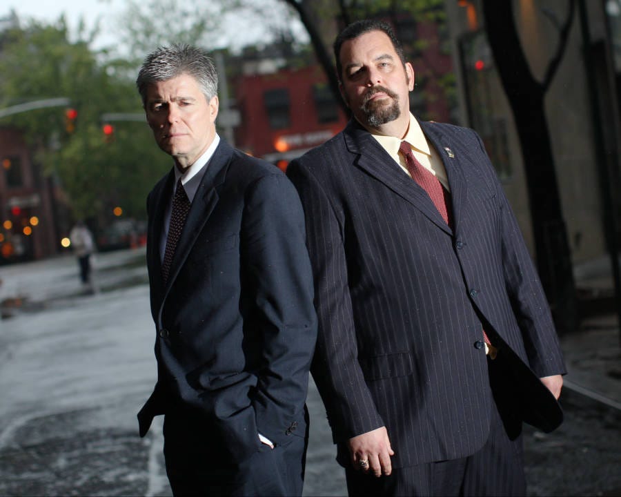 A photo of Detectives Kevin Gannon (left) and Anthony Duarte (right)