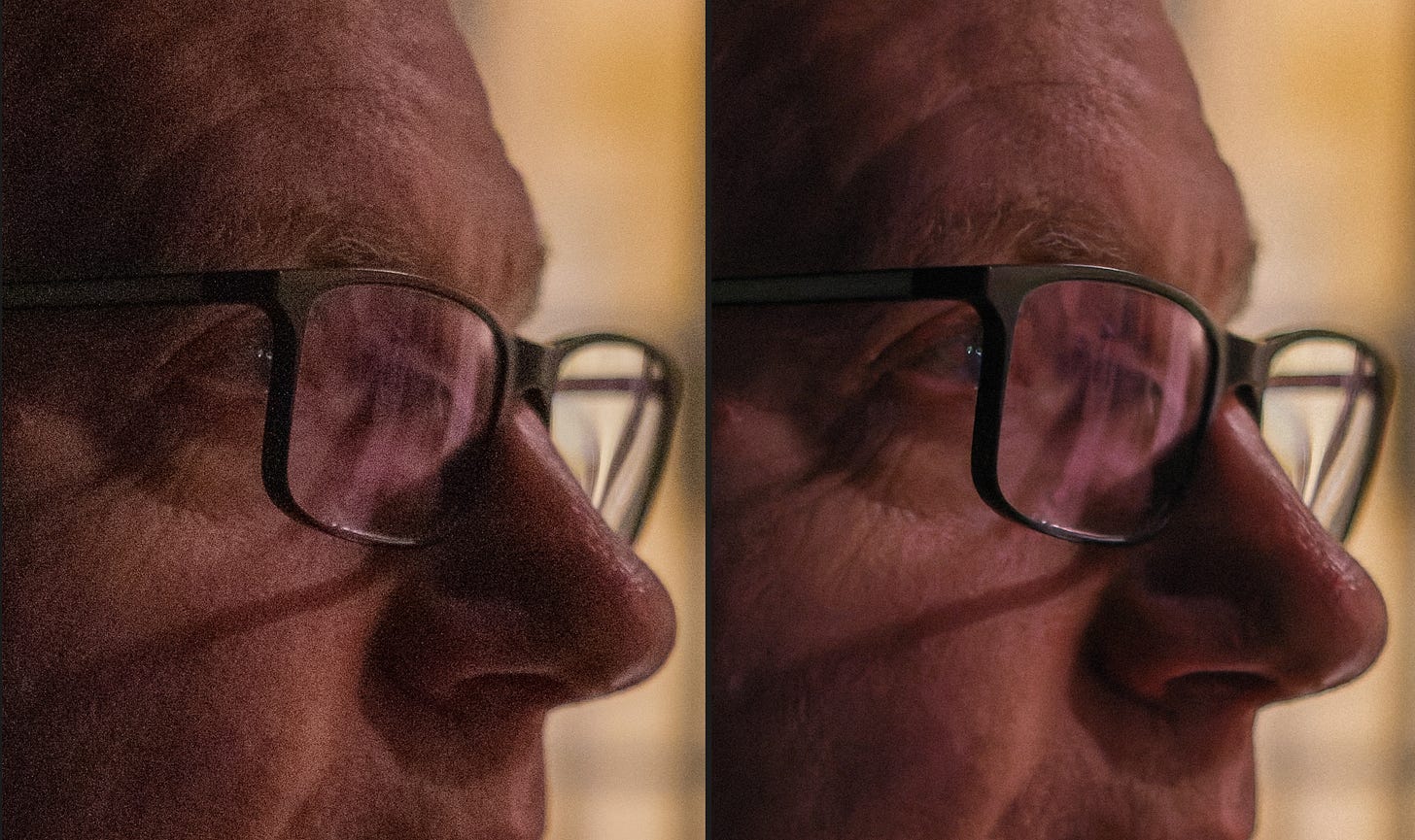 Side-by-side comparison of a zoomed in picture of a man, with just his nose, glasses, and forehead visible. The left image exhibits more digital noise than the processed image on the right.