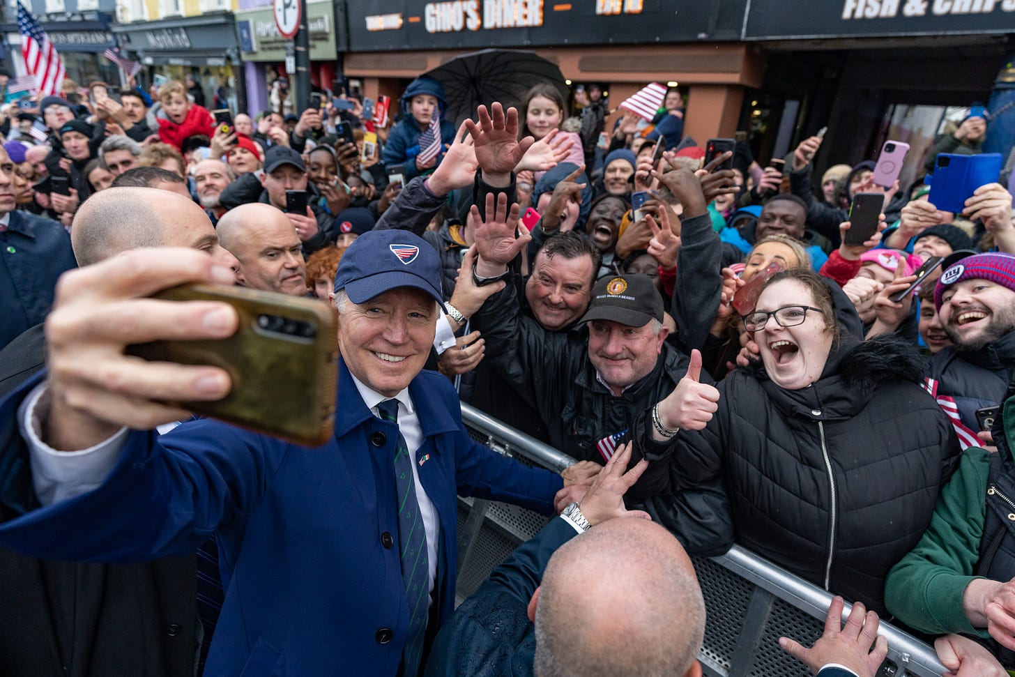 President Biden takes a picture with the people of County Louth.