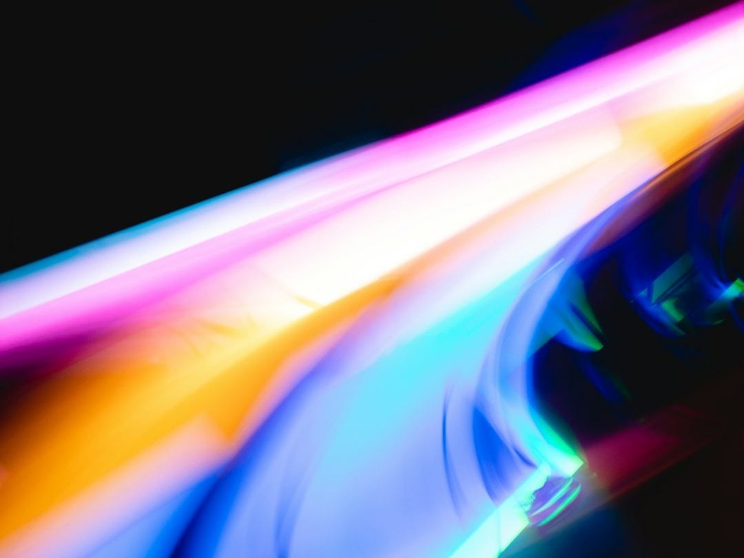 a blurry photo of a cell phone with a blurry background