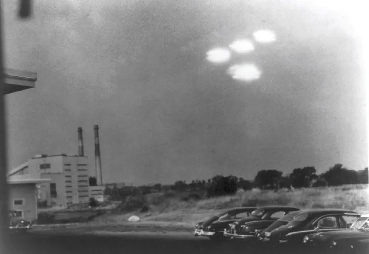 A United States Coast Guard photographer, Shell R. Alpert, took a photograph that allegedly shows unidentified flying objects flying in a “V” formation at the Salem, Massachusetts, air station at 9:35 a.m. on 16 July 1952, through a window screen. Photo is also featured on the cover. Photo: Official U.S. Coast Guard photograph