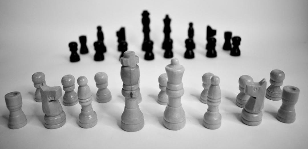 white and black chess piece white and black chess piece