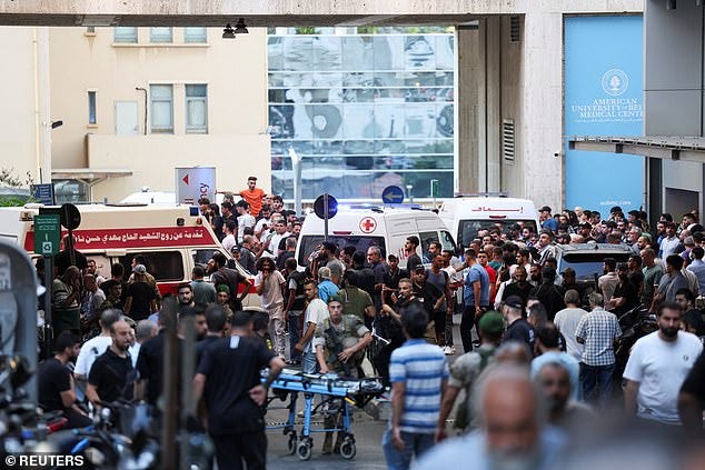 Ambulances arrive to American University of Beirut Medical Centre in the wake of the explosions