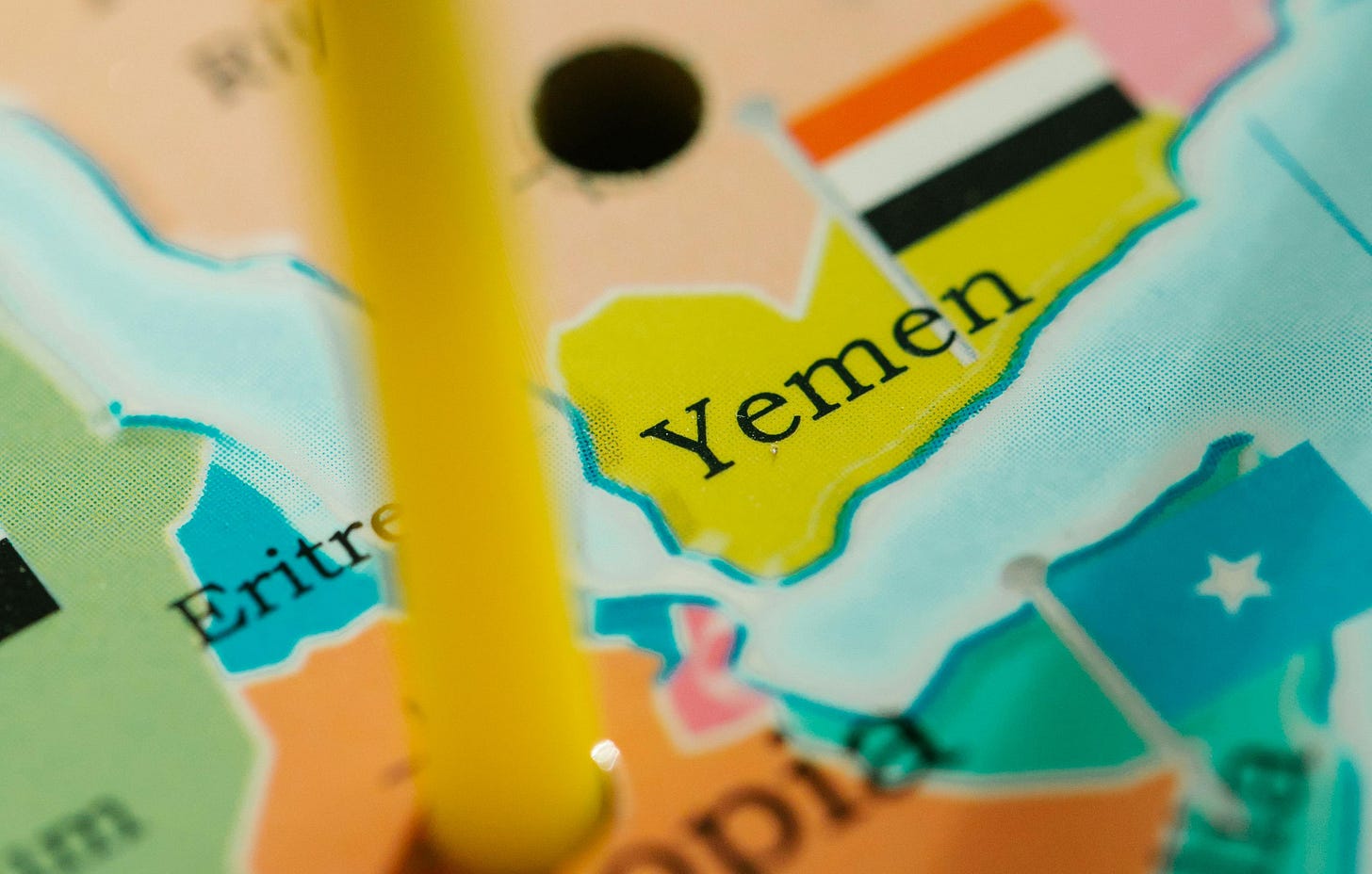 A close-up of a map focusing on Yemen, marked with a pin