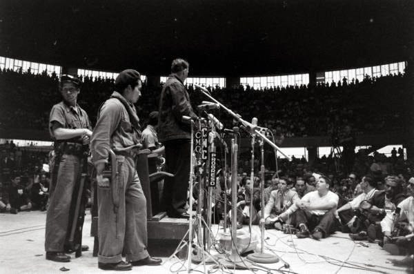 https://upload.wikimedia.org/wikipedia/commons/2/22/Coliseo_de_la_Ciudad_Deportiva_Jes%C3%BAs_Sosa_Blanco_1959_trial.jpg