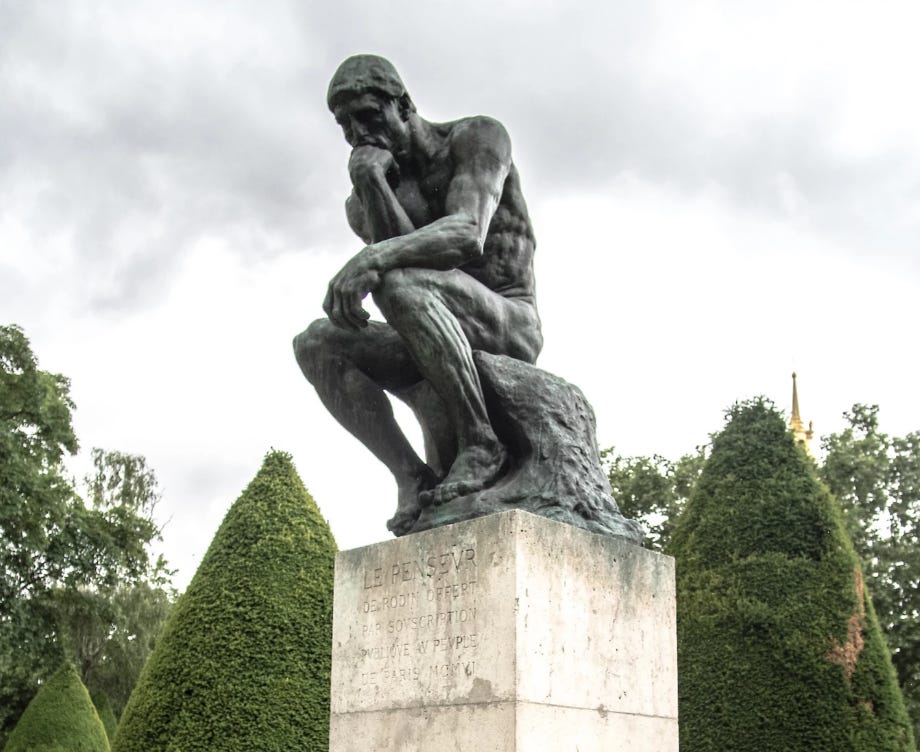 photo of the thinker sculpture by auguste rodin