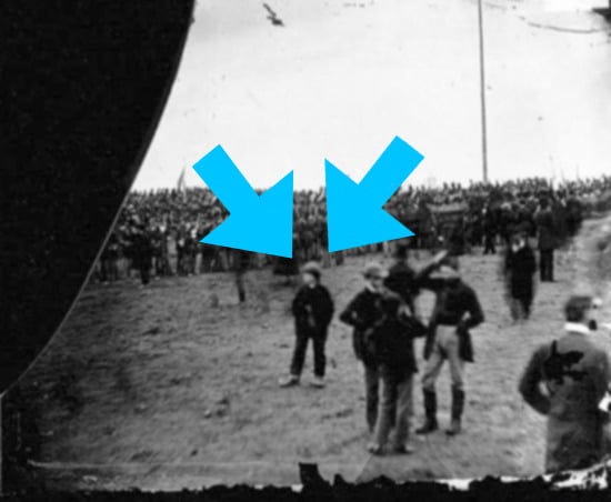 A photo taken during the Gettysburg Address, with a boy standing at center left