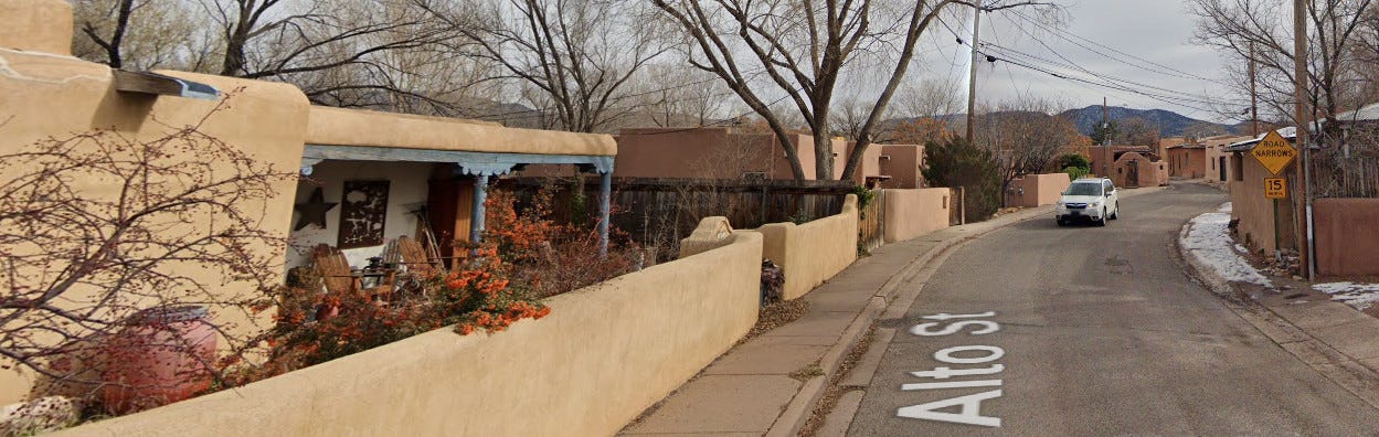 Image of Alto St in Santa Fe. I lived in the house on the left at the time and the little thief led me on the chase right past there