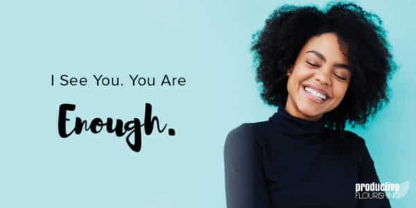 A woman with textured, curly, short hair smiles with her eyes closed. Text Overlay: I See You. You are Enough.