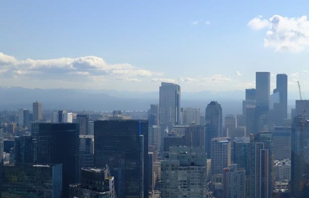 A picture of sunny, clear sikes in Seattle taken from the Space Needle.