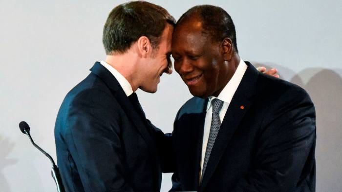 Emmanuel Macron, left, and Alassane Ouattara announced the end of the CFA franc in December