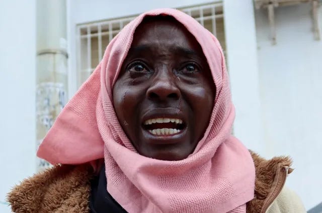 Sudanese refugee, Awadhya Hasan Amine, reacts during a protest asking for evacuation, outside the UNHCR headquarters, in Tunis