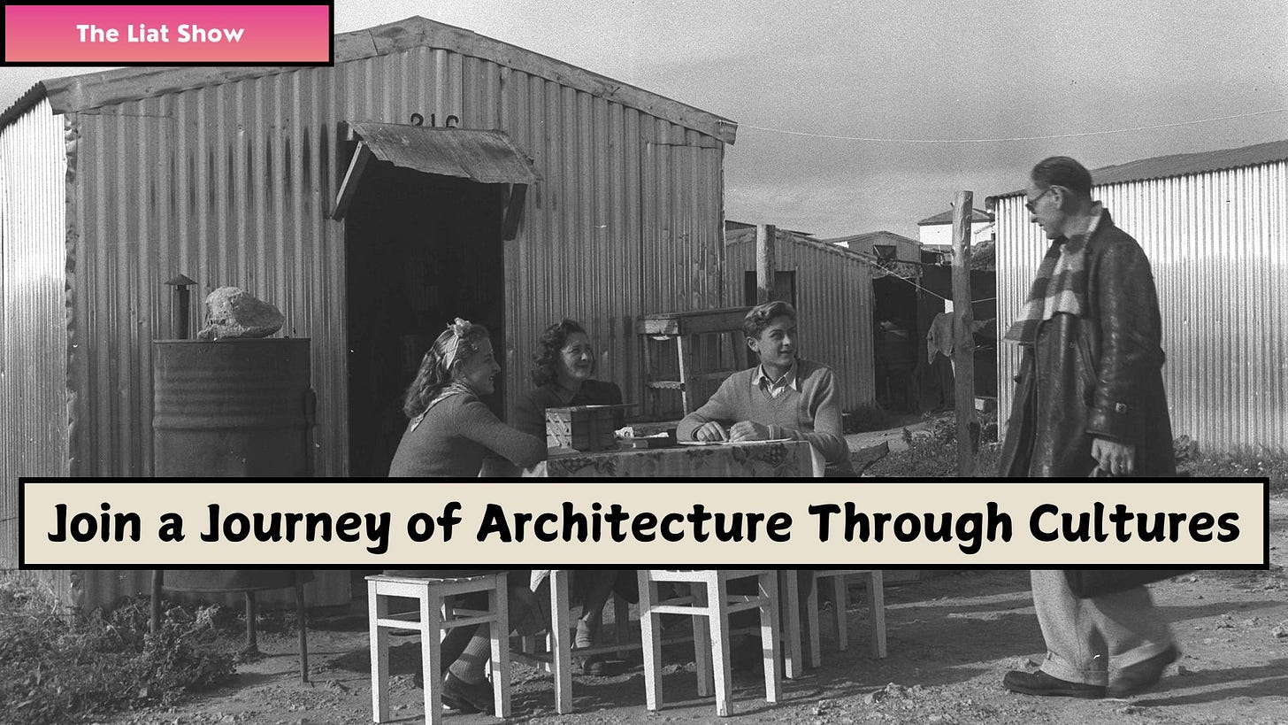 The Liat Show: Ma’abara near Nahariya, 1952. In the picture: A black-and-white photograph shows a group of immigrants sitting outside around a small table beside metal-clad housing units in a transit camp near Nahariya. Three women and a young man sit together smiling, while another man in a coat and scarf walks by. The structures behind them are corrugated tin huts, typical of Ma’abarot. A metal barrel stove and a clothesline in the background hint at the improvised living conditions. This image captures a moment of everyday life during Israel’s early statehood.