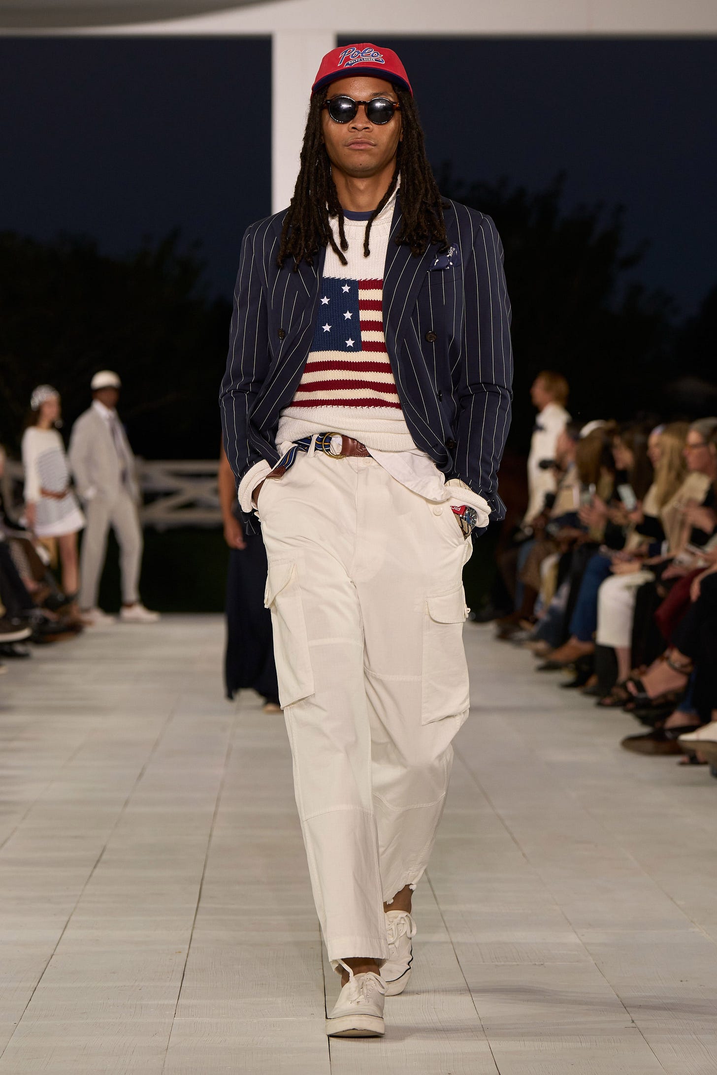 Image may contain Fashion Accessories Glasses Adult Person Clothing Pants Hat Glove Blouse Footwear and Shoe