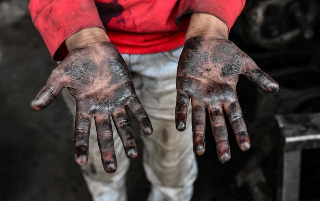 Le foto shock dei bambini al lavoro negli USA nei primi 900