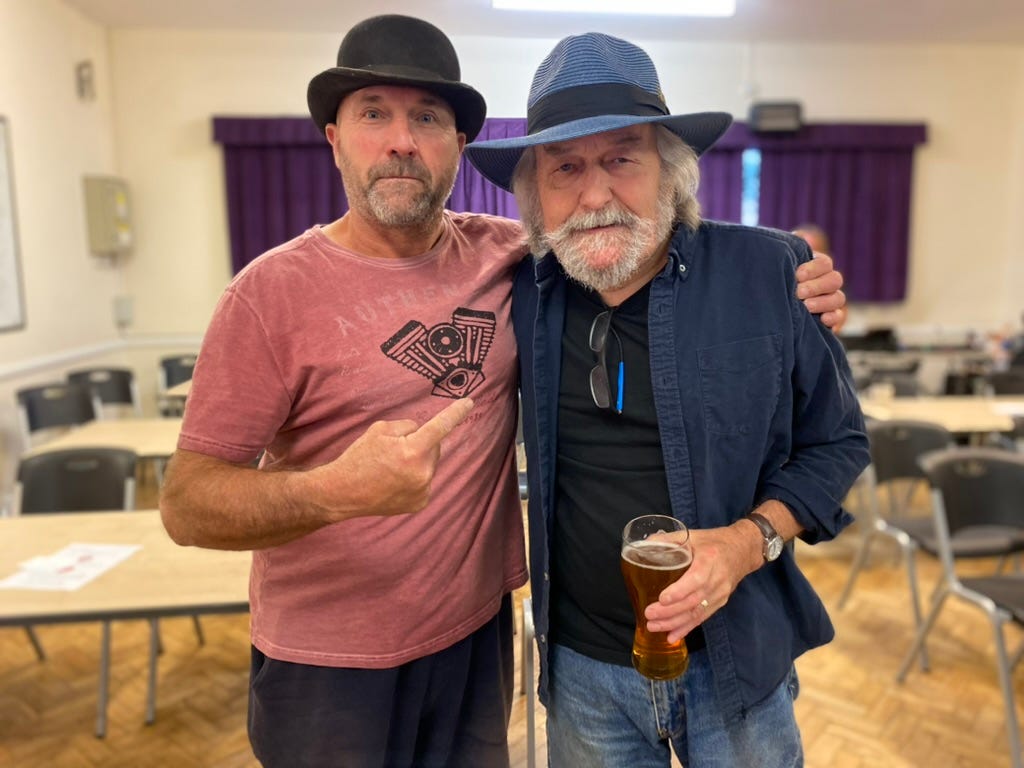 Two gents wearing cool hats