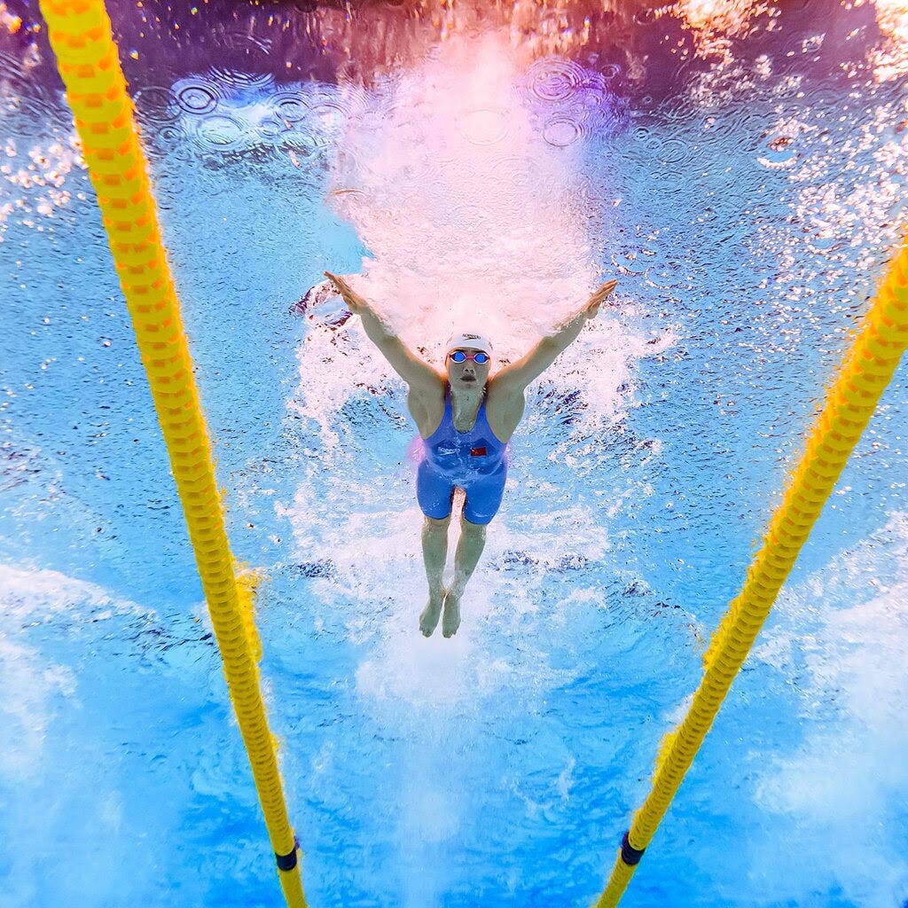 An underwater shot of a swimmer. 