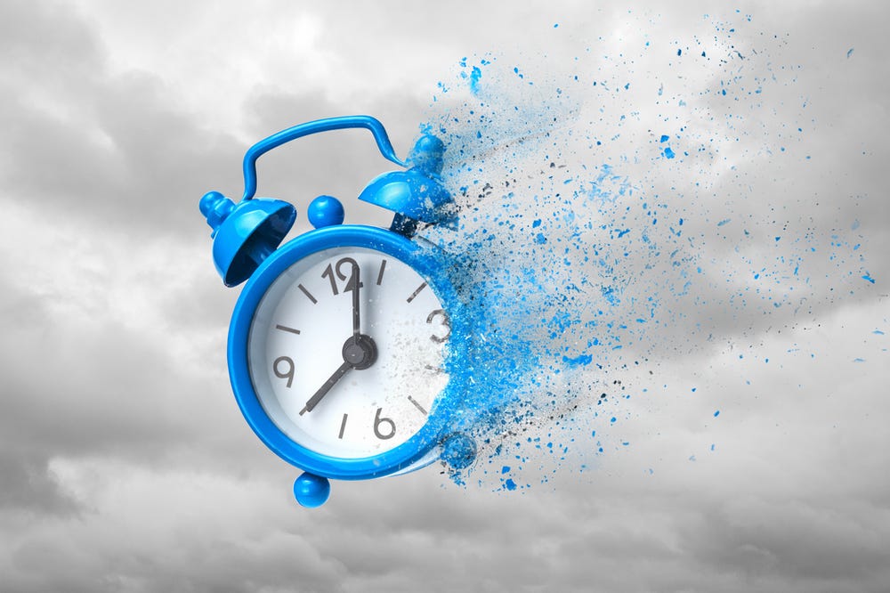Blue Alarm clock dissolving 