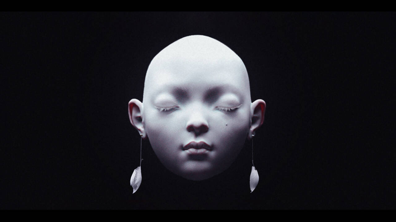 White female face with wide positioned eyes on a black background. White female face with wide positioned eyes on a black background.