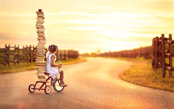 Fonds d'écran Enfant fille, petit vélo, beaucoup de livres 1920x1200 HD  image