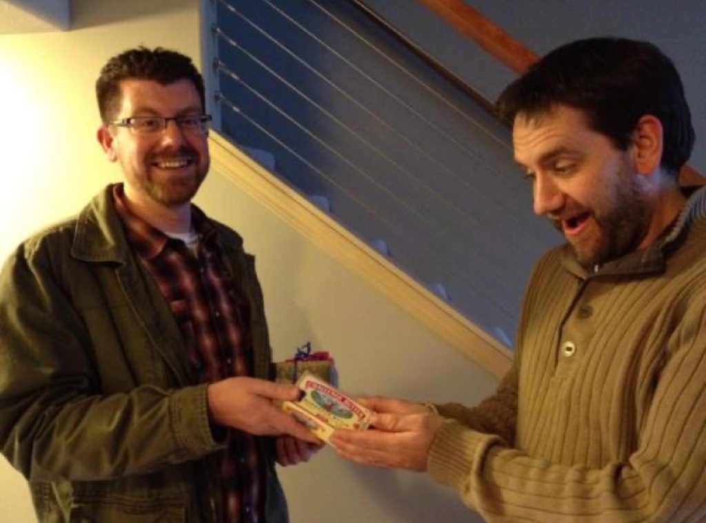 A samaritan handing out butter for Christmas.