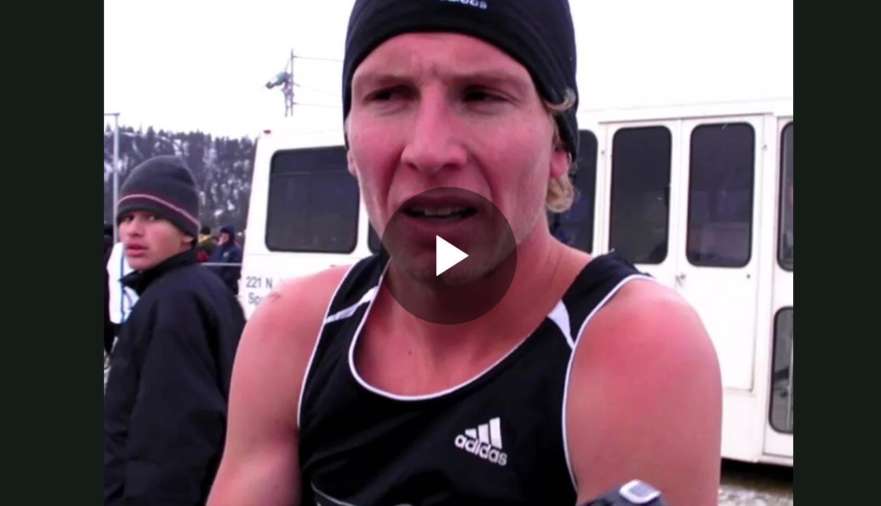 Image of Scott giving an interview in the cold after his race.