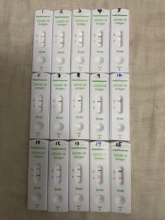 15 covid rapid test cassettes showing a strong positive that turned negative after several days' treatment with paxlovid, resulting in four days of freedom and negative tests, following by a new strong positive and another week of this nonsense.