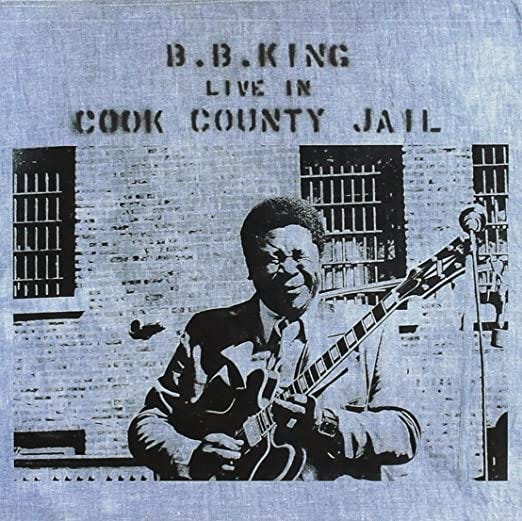 BB King hits a note around the 12th fret on the cover of his album Live in Cook County Jail