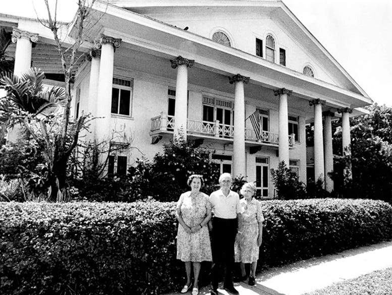 Figure 5: Autumn, George and Elmina Warner stand outside of family home in 1978
