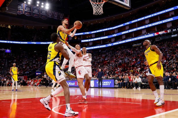 Tyrese Haliburton of the Indiana Pacers shoots the ball in front of Dillon Brooks of the Houston Rockets in the first half at Toyota Center on...