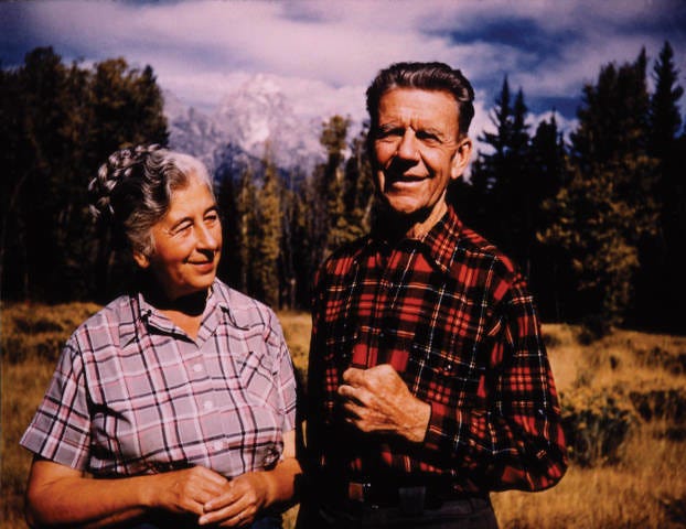 photo of mardy and olaus murie in plaid shirts and mountains in background
