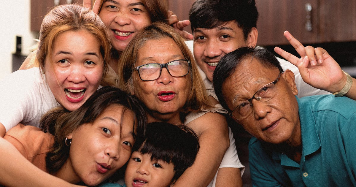 Filipino family posing for a photo.