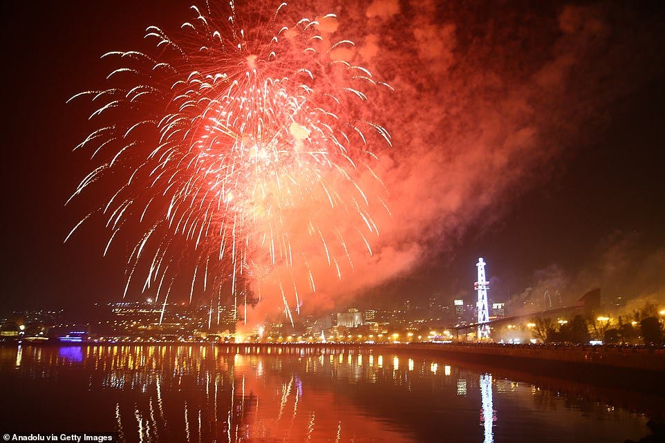 BAKU: Fireworks light up the night sky over the city to welcome the New Year 2025 as people gather to watch fireworks during the New Year celebrations in Baku, Azerbaijan on January 01, 2025