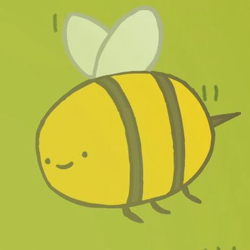 yellow bee with a green grassy background