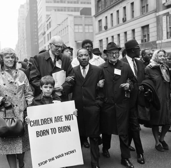 The Rev. Dr. Martin Luther King Jr. at an antiwar demonstration in New York in April 1967, with Dr. Benjamin Spock to his right.