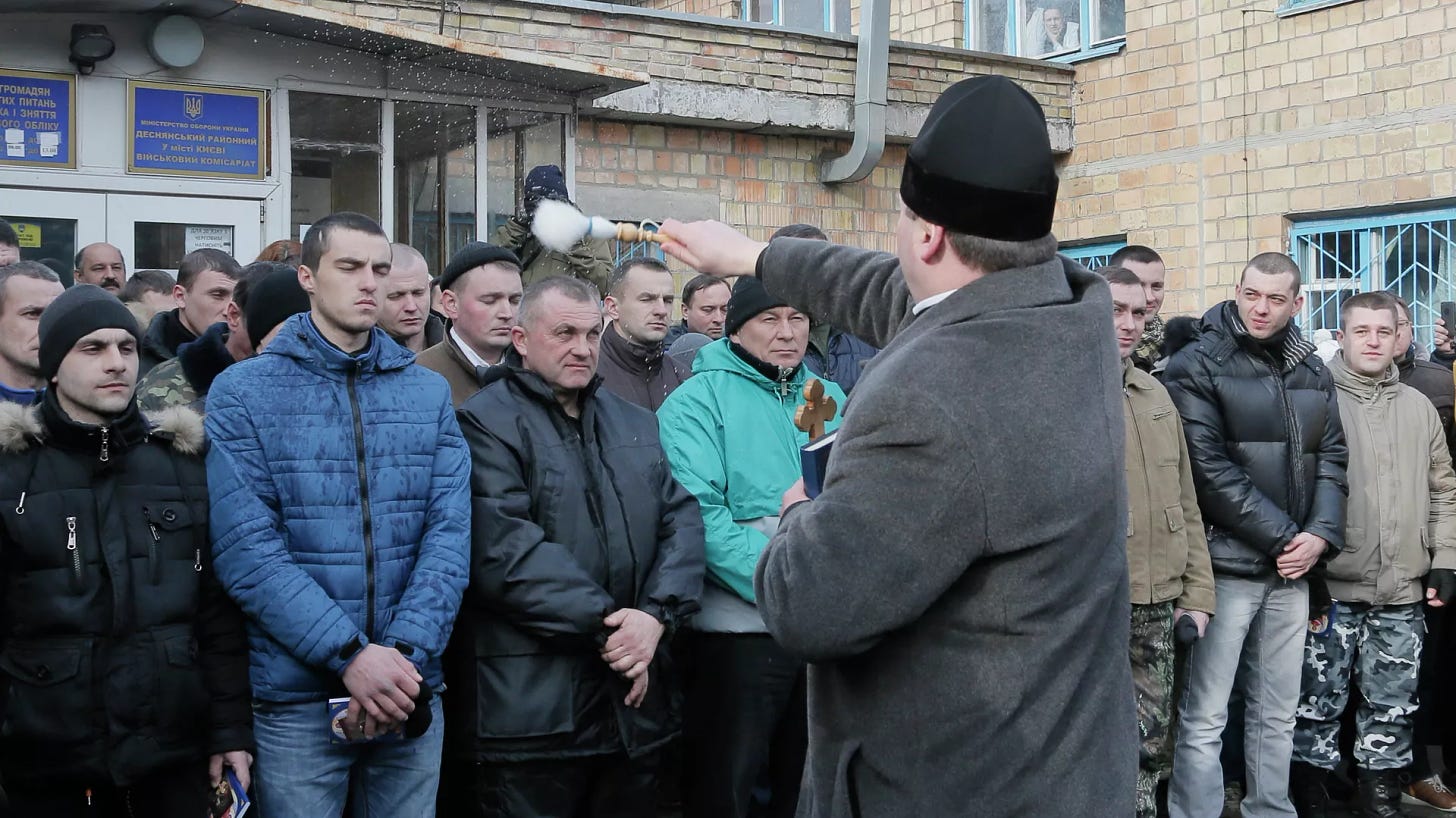 A priest blesses newly-mobilized recruits in front of a military registration office before they leave for military units, in Kiev, Ukraine, Thursday, Jan.29, 2015 - Sputnik International, 1920, 14.08.2023