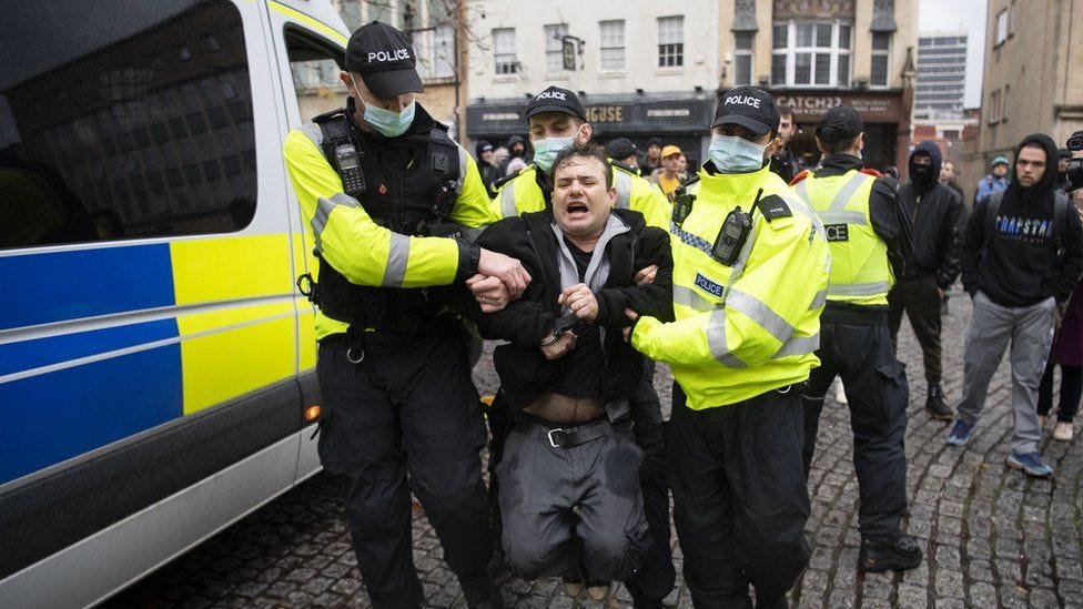 Covid: Police in Bristol arrest 14 at anti-lockdown march - BBC News